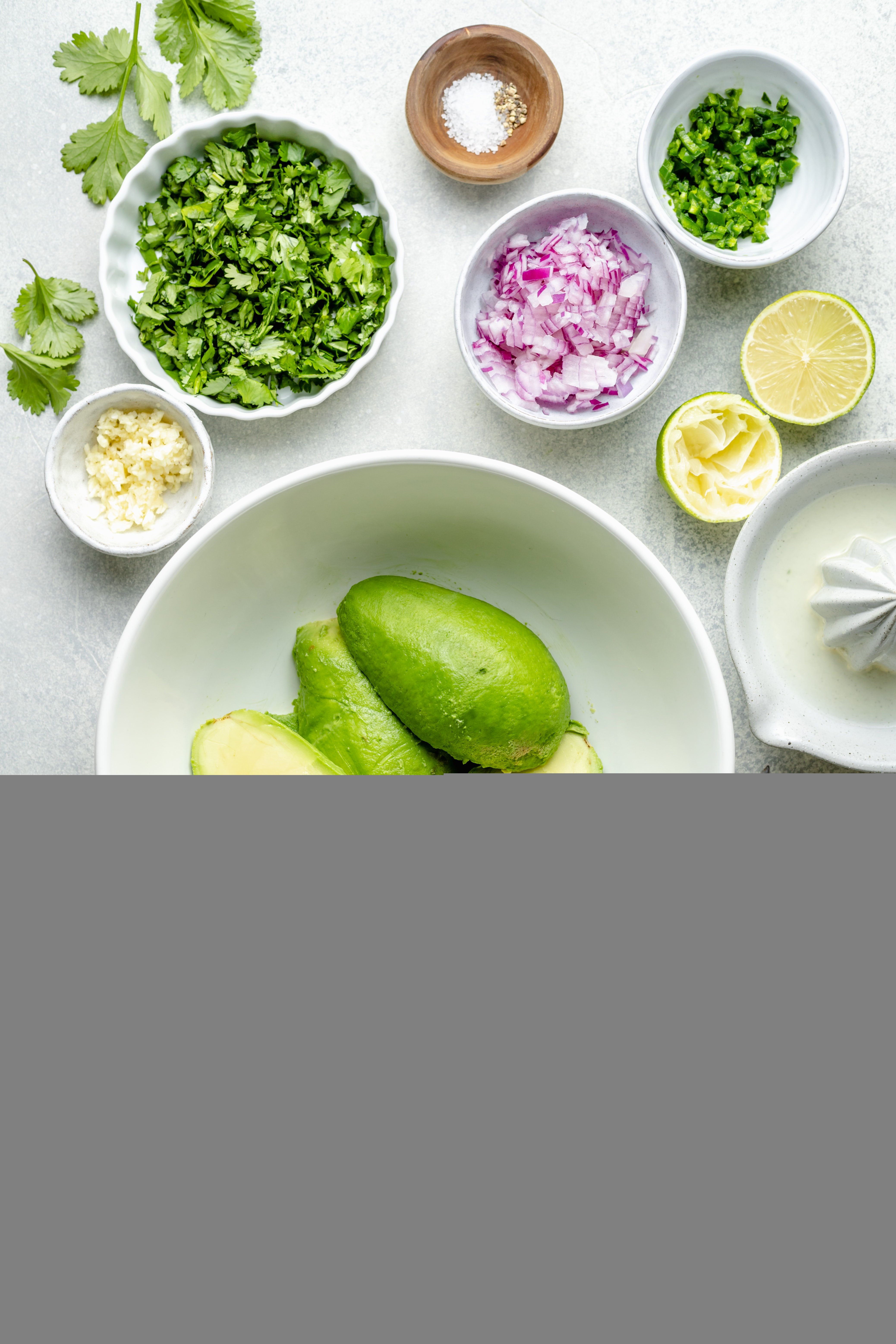 avocado halves in bowls