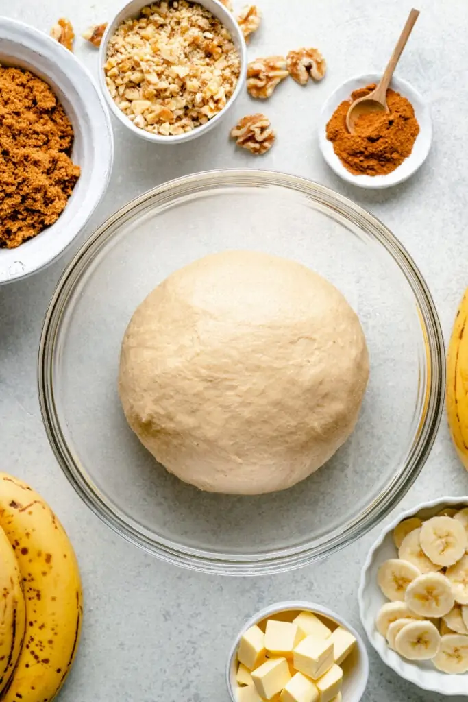 banana cinnamon roll dough in bowl