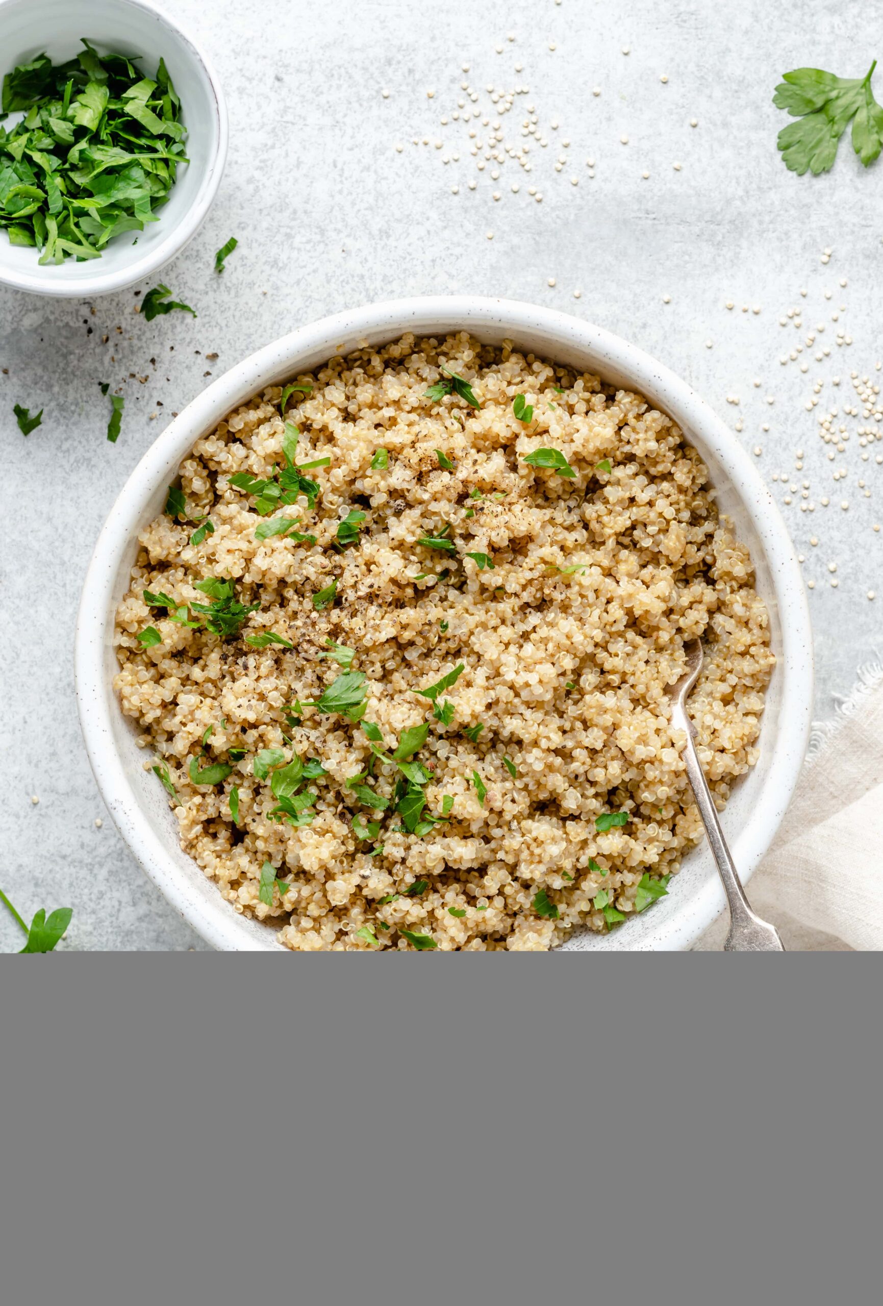 cooked quinoa in bowl with fork