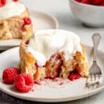 raspberry sweet roll on plate with fork