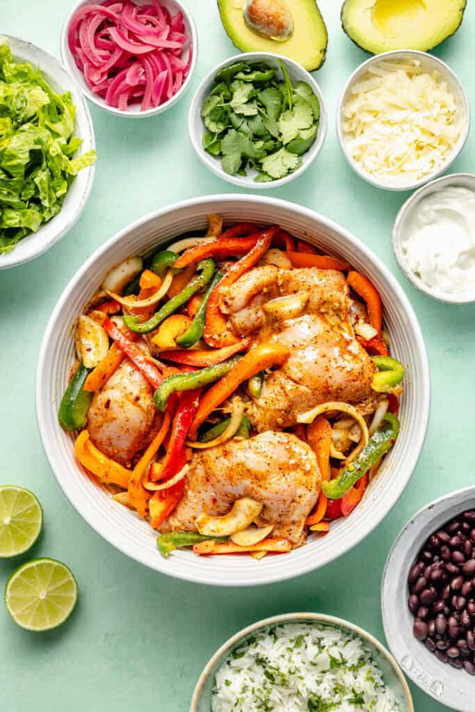 chicken and veggies in mixing bowl
