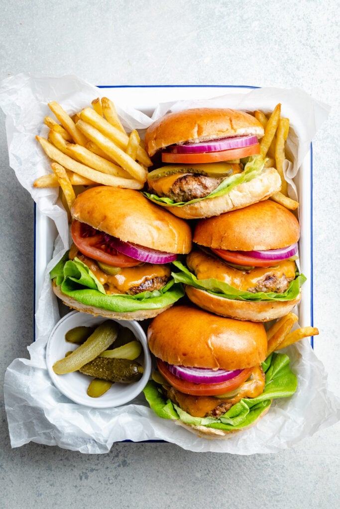 chicken burgers with fries and pickles