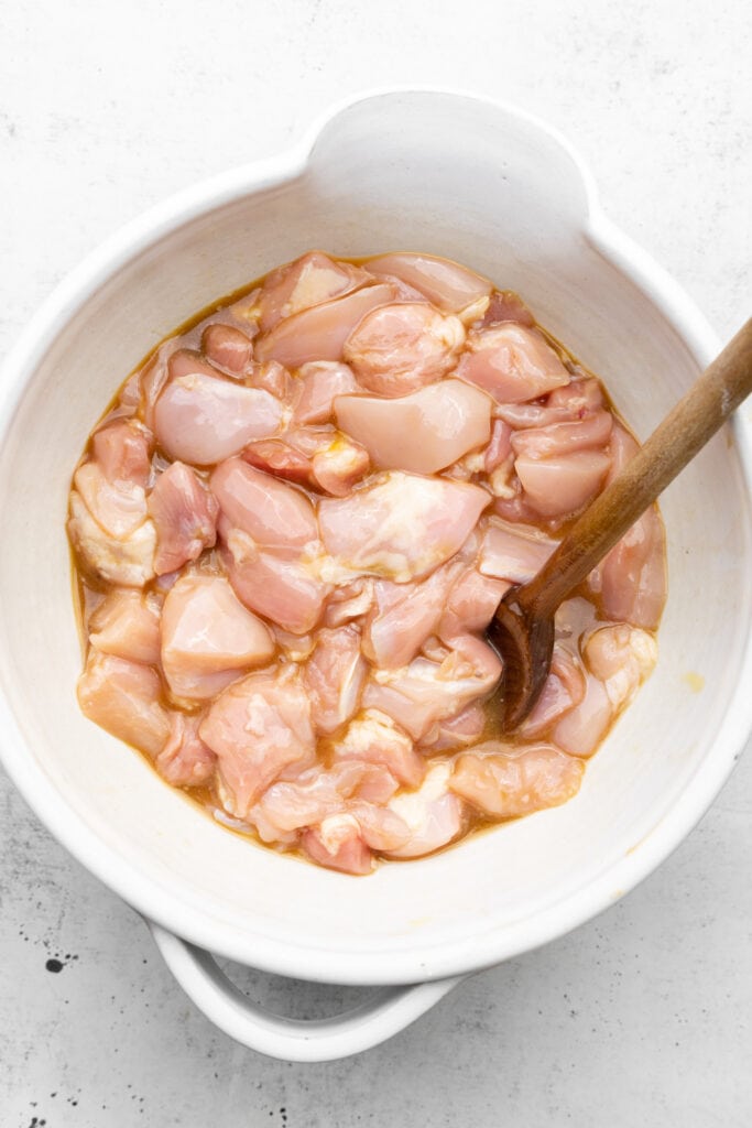 chicken thigh pieces in marinade