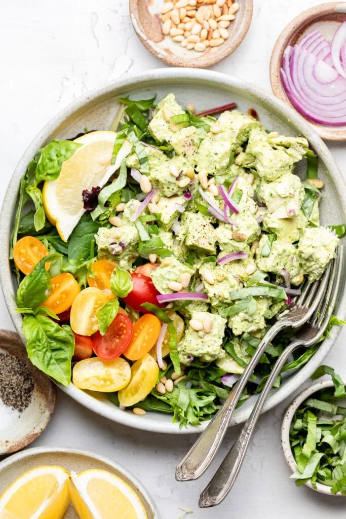 pesto chicken salad with greens and tomatoes