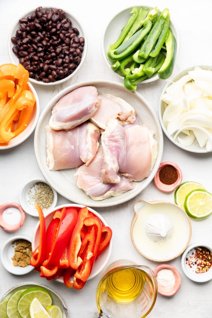 https://allthehealthythings.com/wp-content/uploads/2022/03/sheet-pan-chicken-burrito-bowls-683x1024.jpg