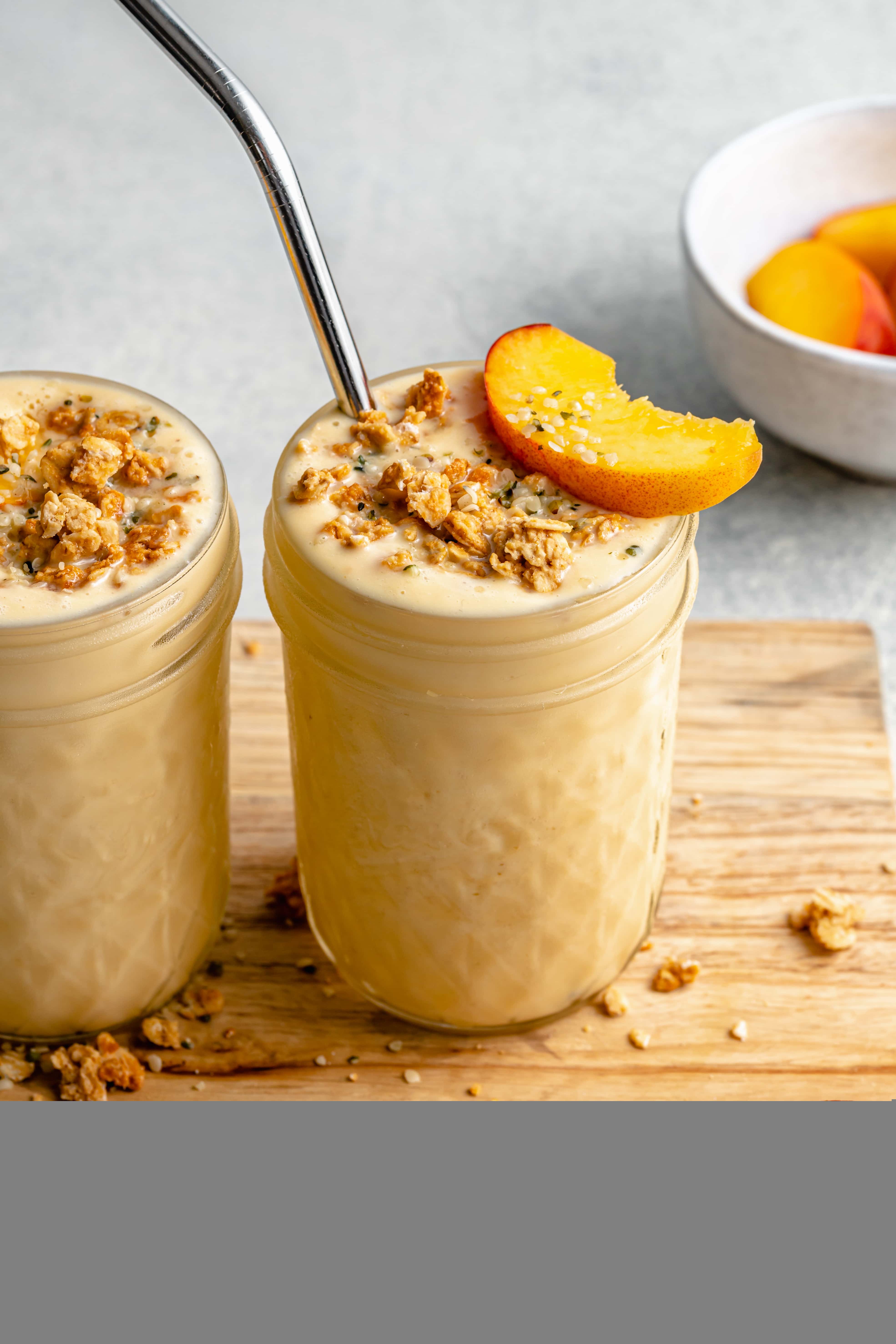 creamy peach smoothie in glass