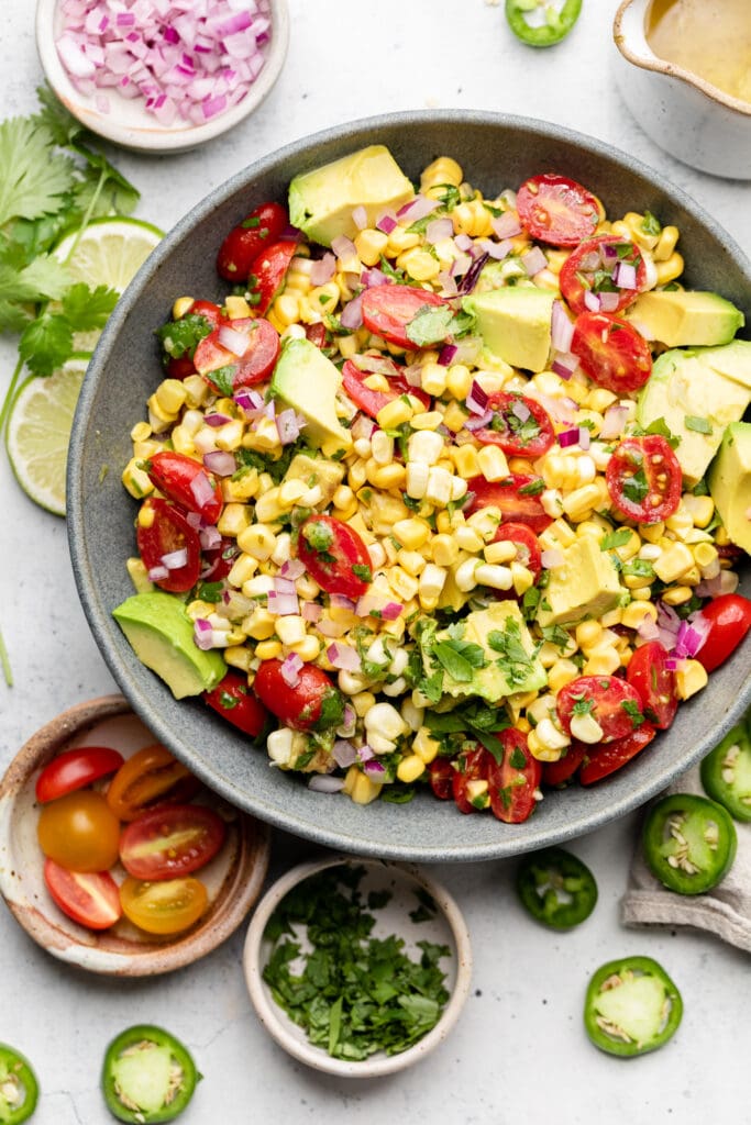 avocado corn salad in mixing bowl