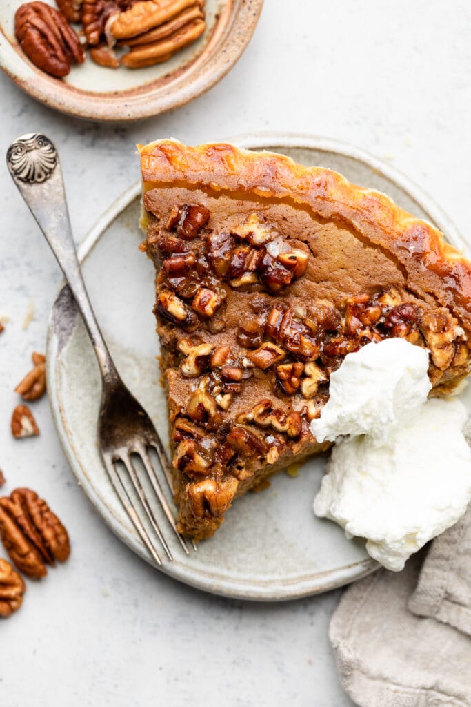 pumpkin pecan pie with whipped cream