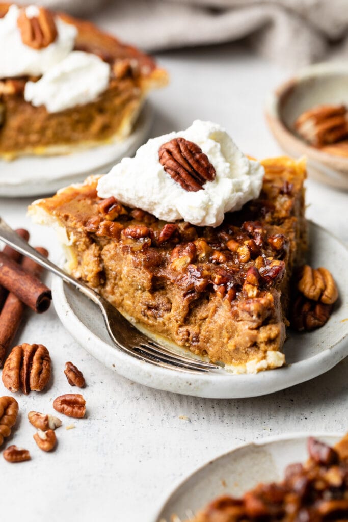 pumpkin pecan pie with whipped cream