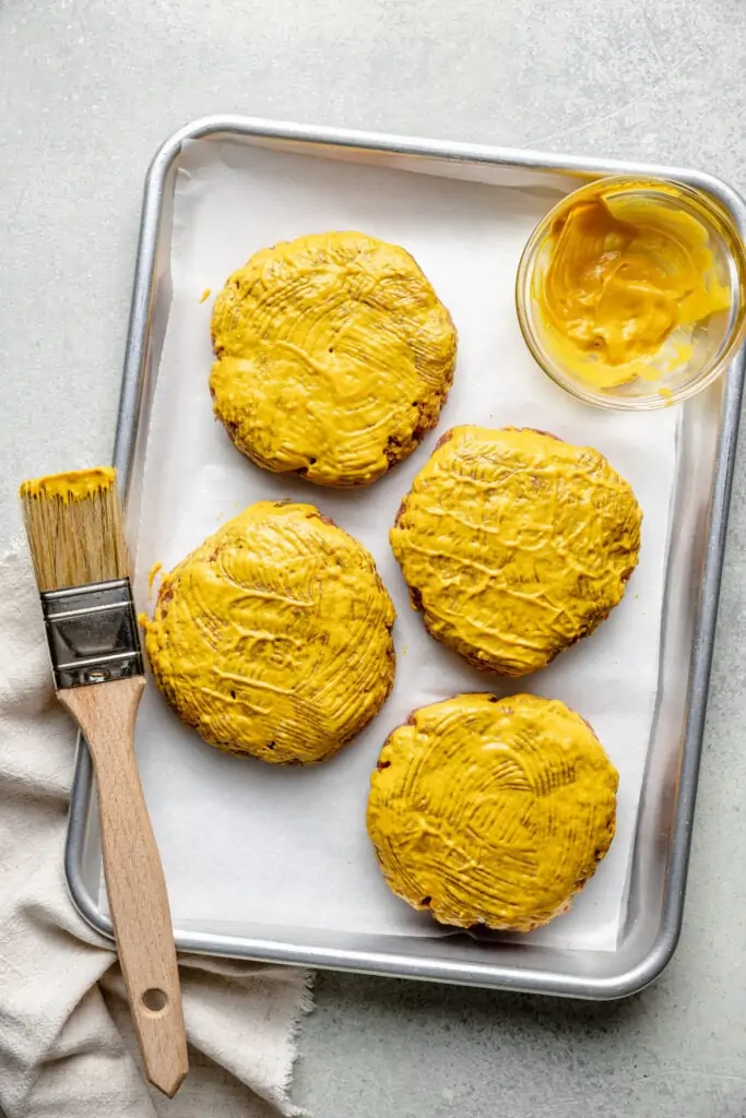 burger patties with mustard