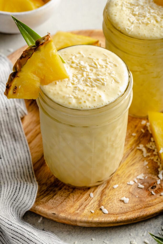 pina colada smoothie topped with coconut
