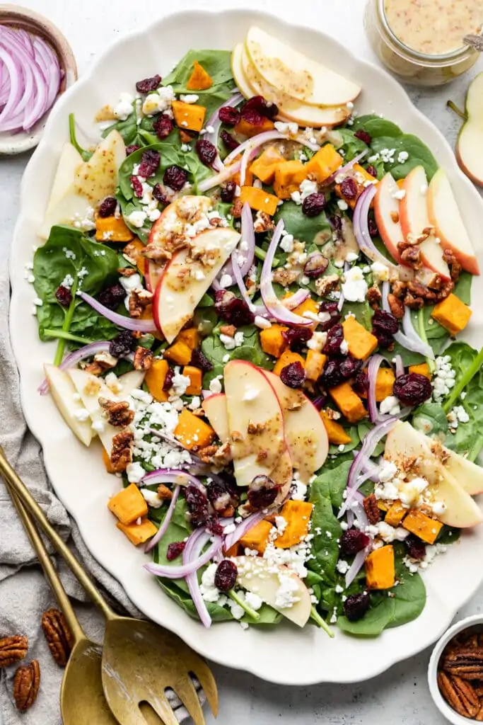 roasted sweet potato and spinach salad on plate