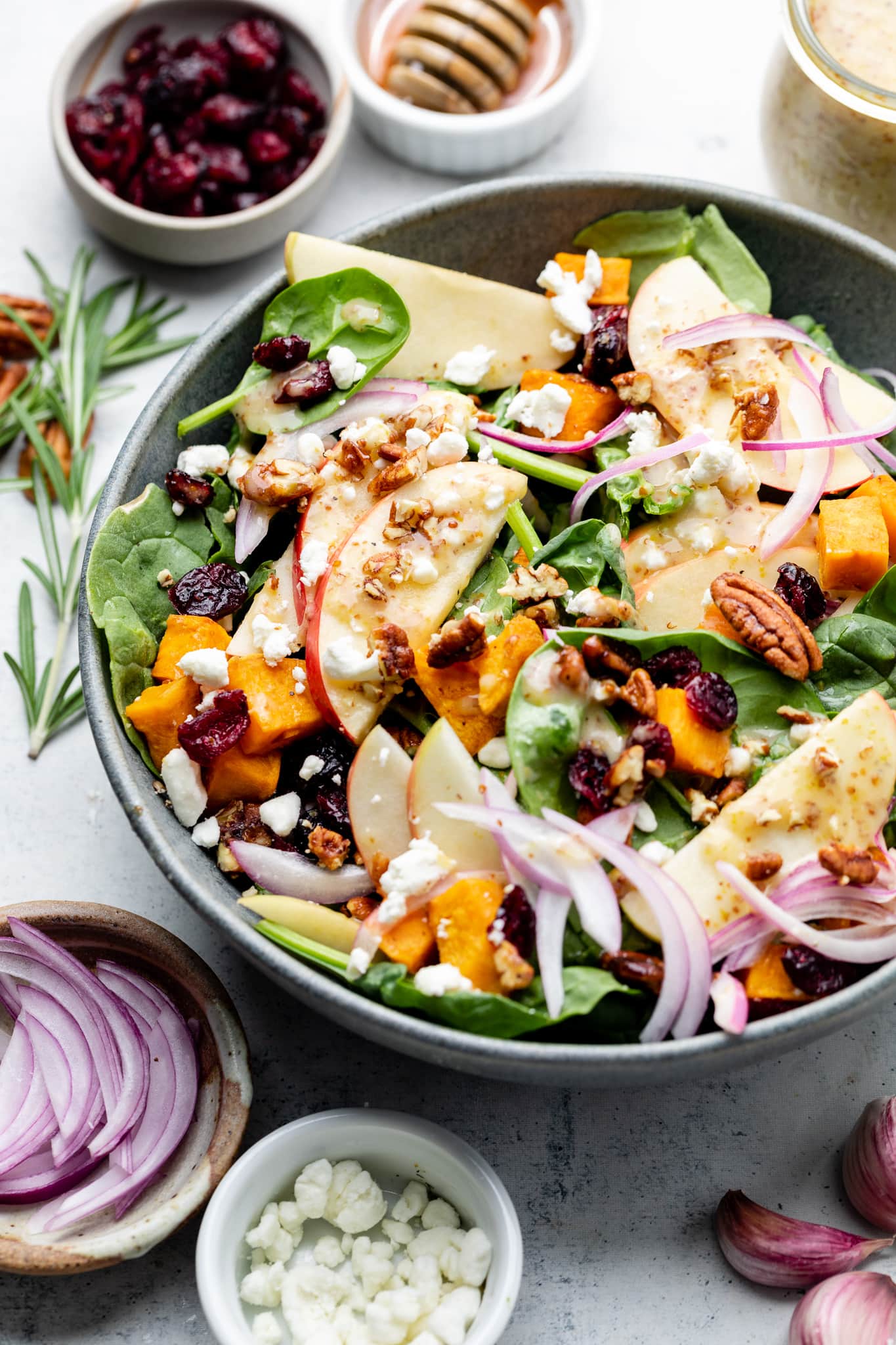 roasted sweet potato spinach salad in bowl