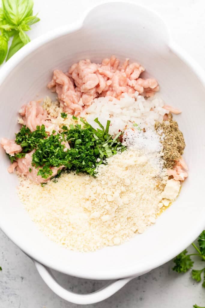 chicken parmesan meatball ingredients in bowl