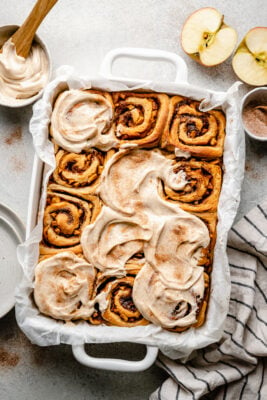 cinnamon rolls with cream cheese on top