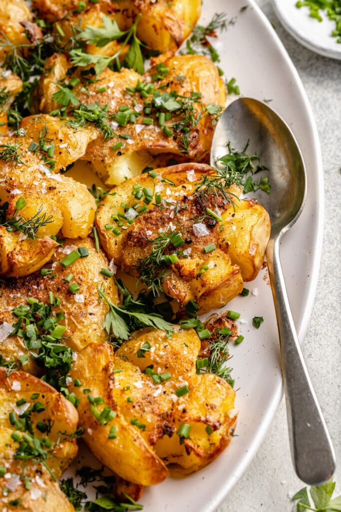 Super Crispy Smashed Potatoes (With Herbs) - Alphafoodie