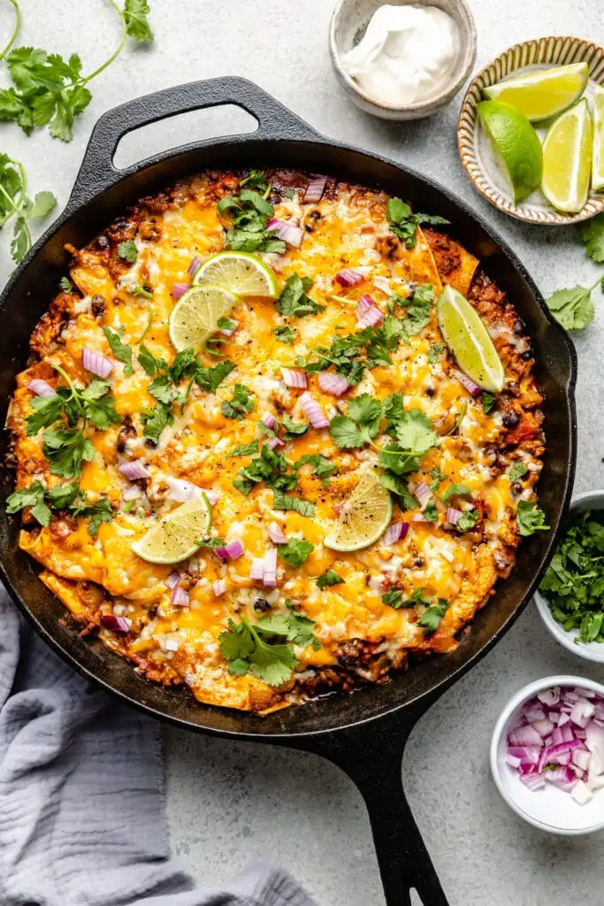 beef enchilada casserole in skillet