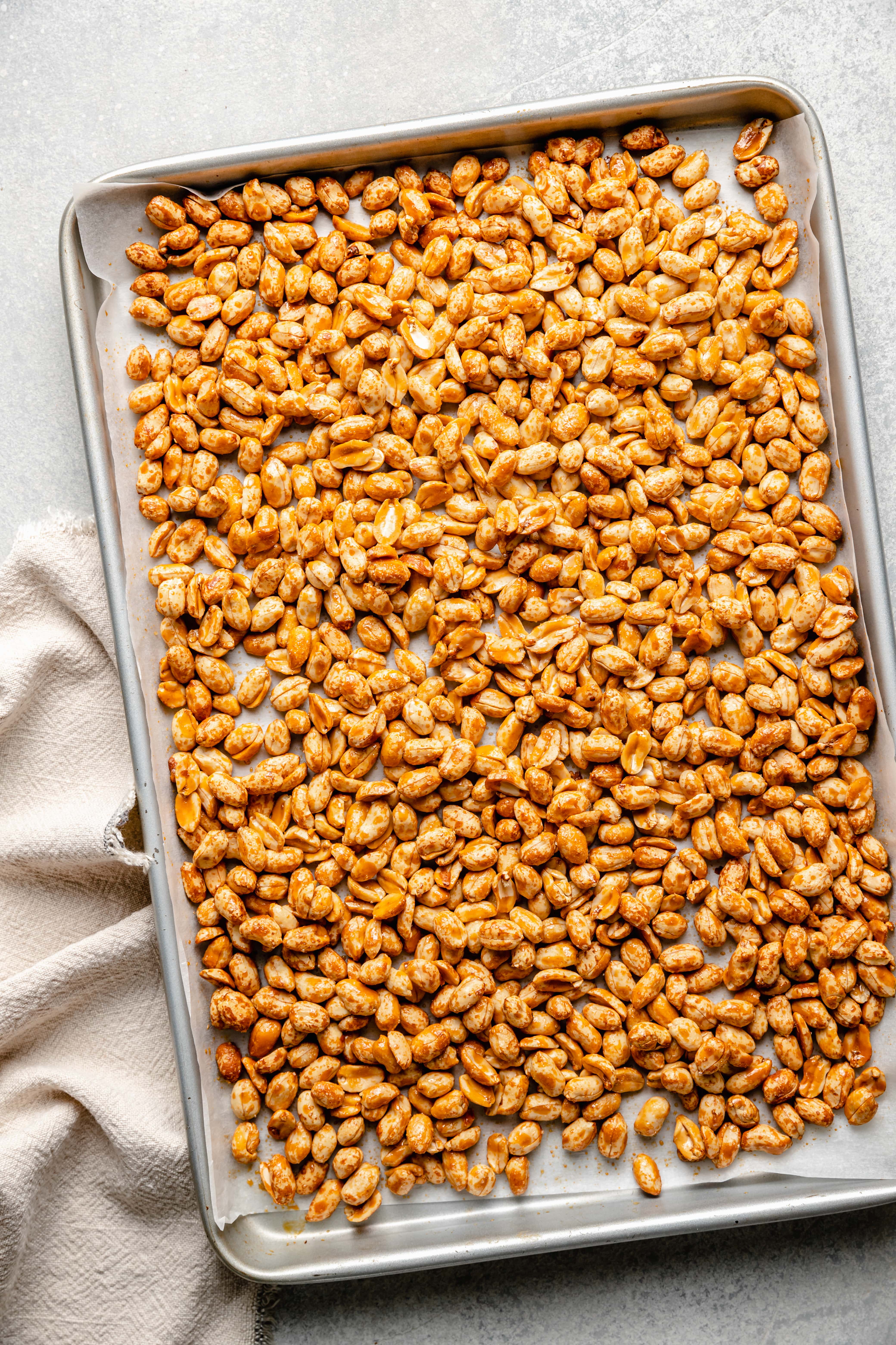 roasted peanuts on a sheet pan