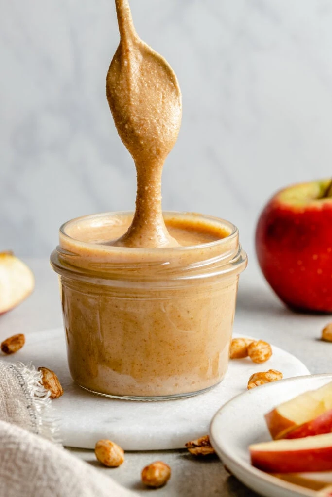 peanut butter in jar with spoon