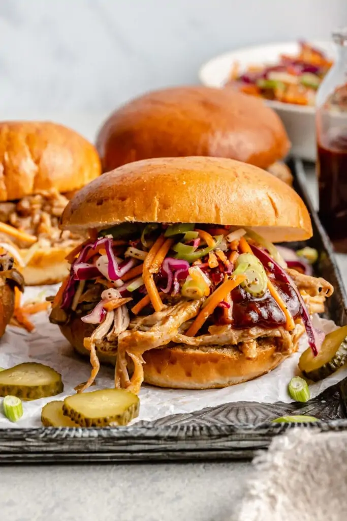pulled pork on buns with coleslaw
