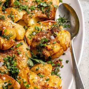 crispy smashed potatoes on platter