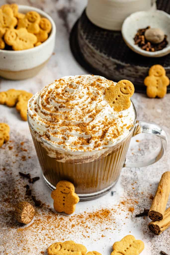 gingerbread latte with whipped cream and gingerbread cookies