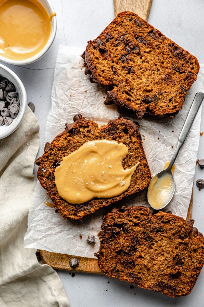 sliced peanut butter banana bread with peanut butter