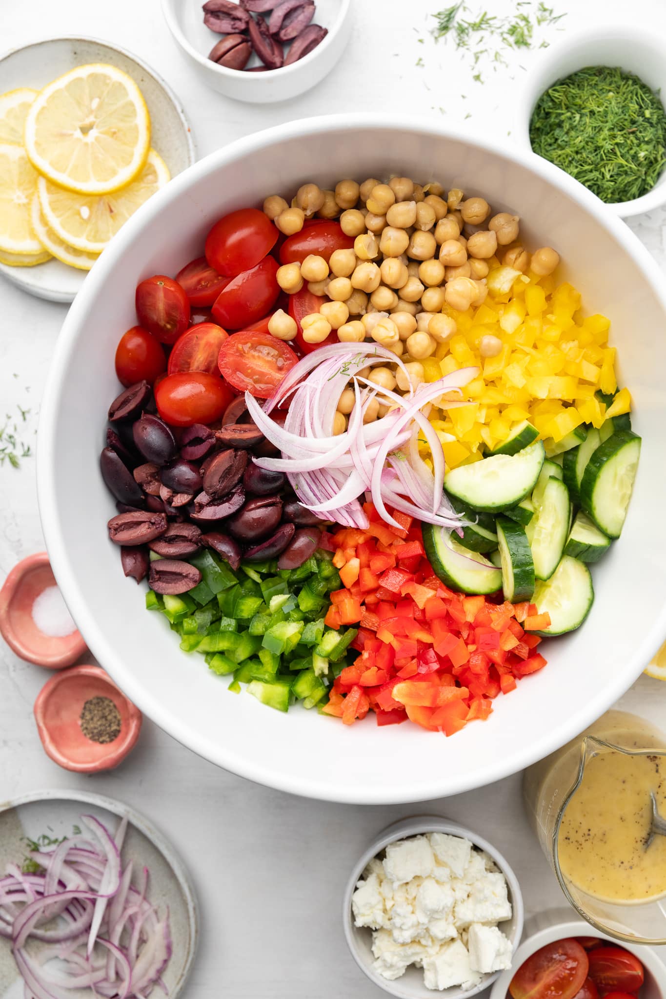 salad ingredients in mixing bowl