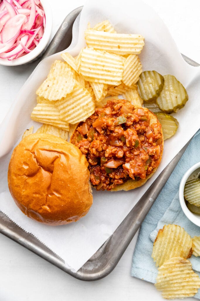 sloppy Joe with chips and pickles