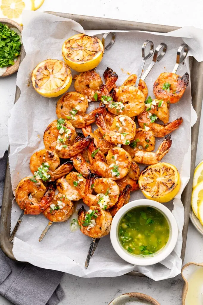 grilled shrimp on sheet pan with lemons