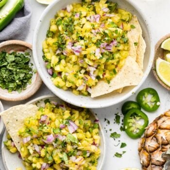 pineapple salsa in bowls with chips