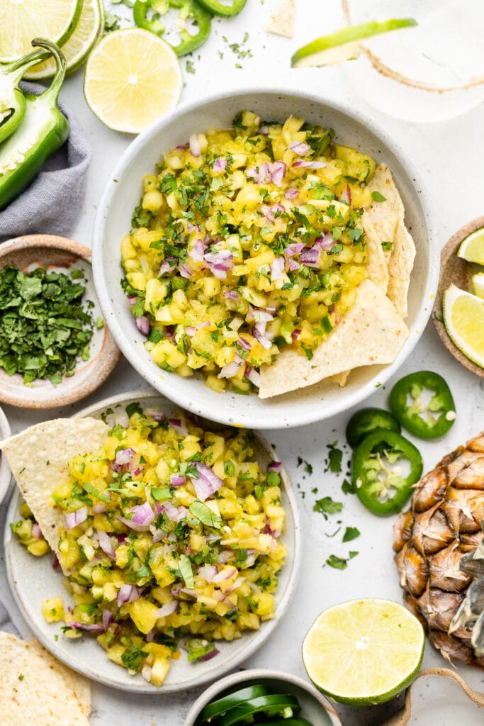 pineapple salsa in bowls with chips