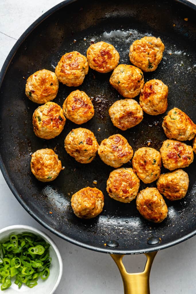 pork meatballs in frying pan