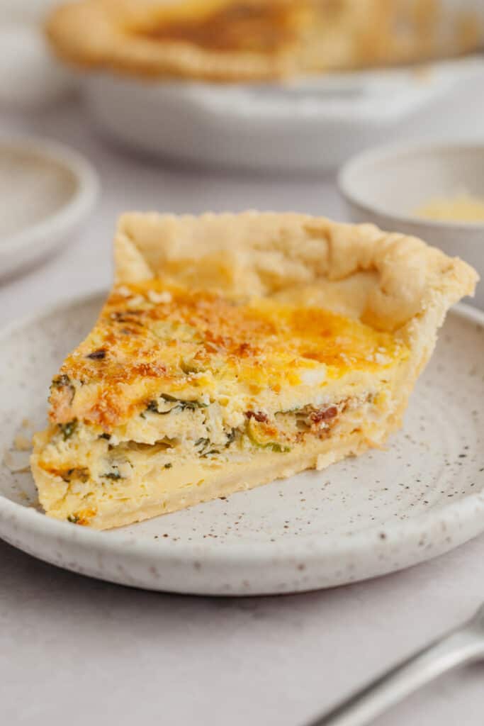 slice of quiche on plate