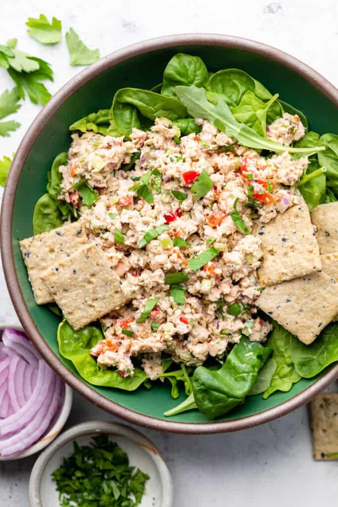 salmon salad with greens and crackers