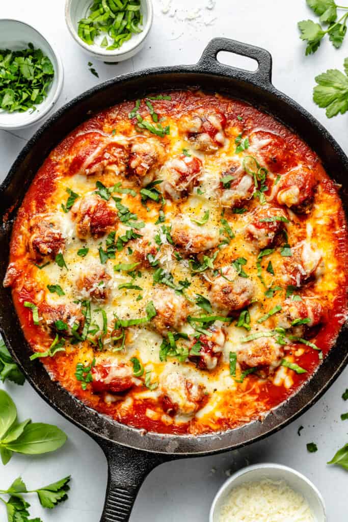 cheesy baked meatballs in skillet 
