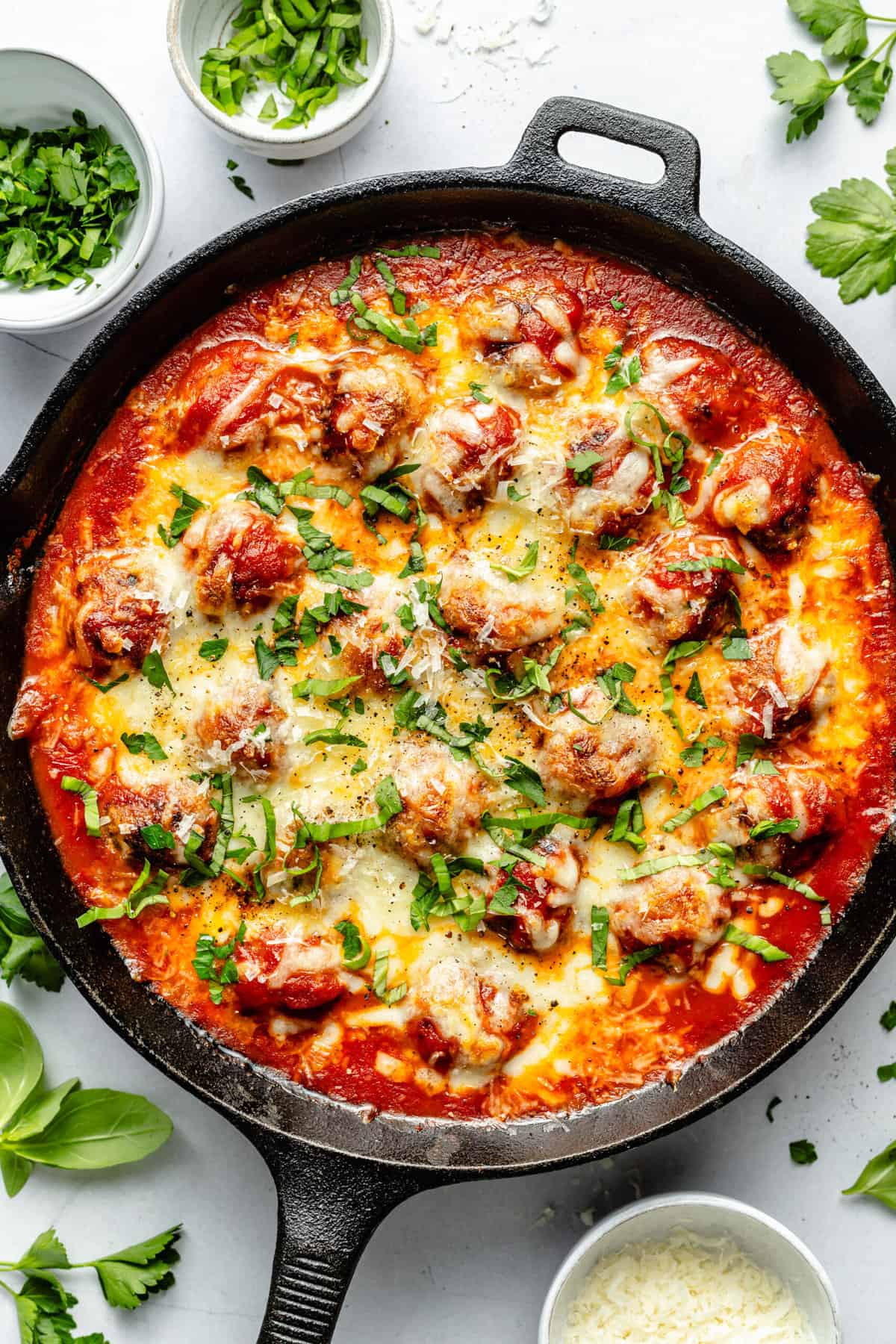 cheesy baked meatballs in skillet