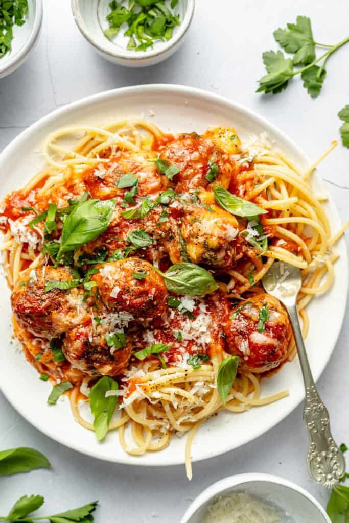 meatballs and sauce over spaghetti