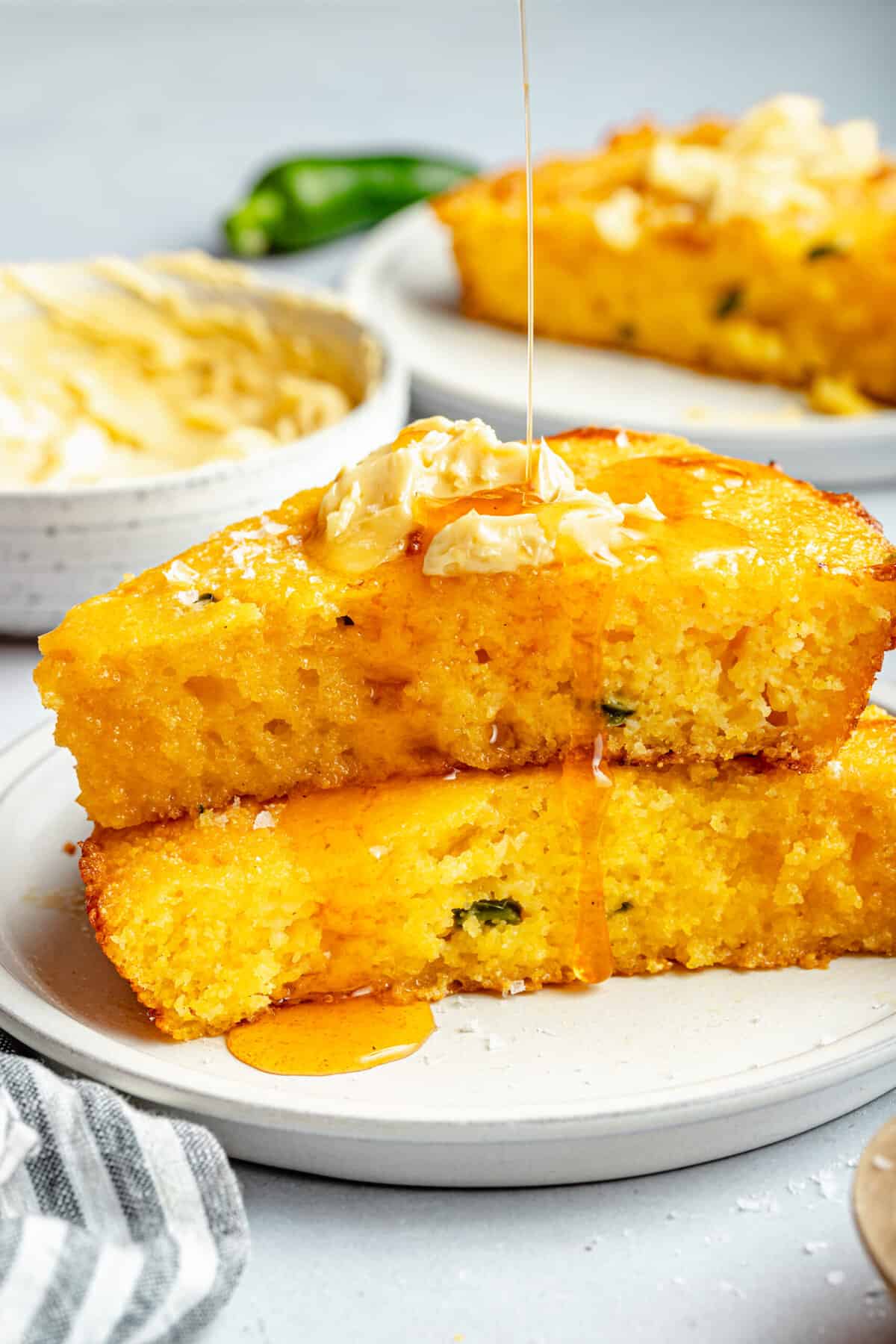 https://allthehealthythings.com/wp-content/uploads/2023/08/Jalapeno-Cheddar-Skillet-Cornbread-with-Whipped-Hot-Honey-Butter-6-scaled.jpg