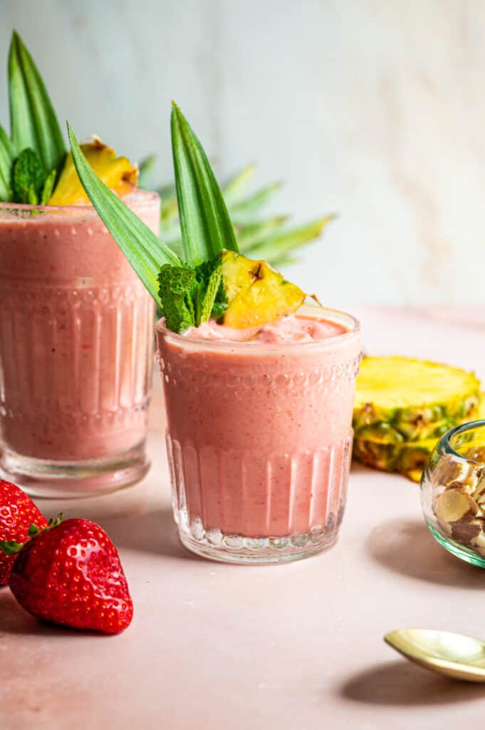 smoothie in glass with pineapple slice