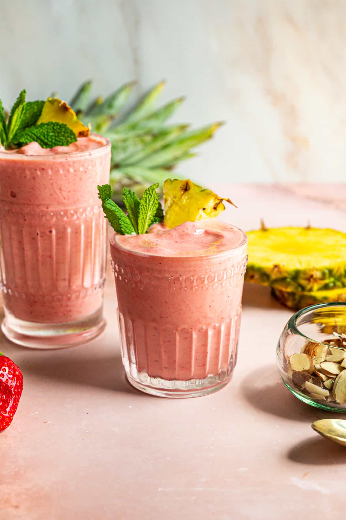 smoothie in glass with pineapple slice