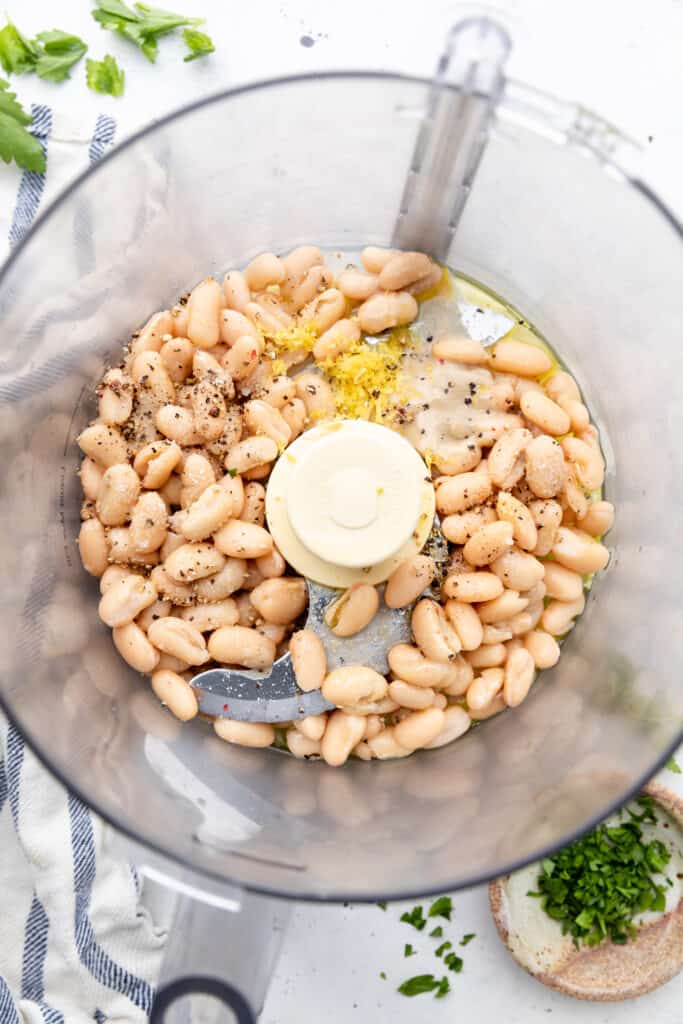white bean dip ingredients in food processor