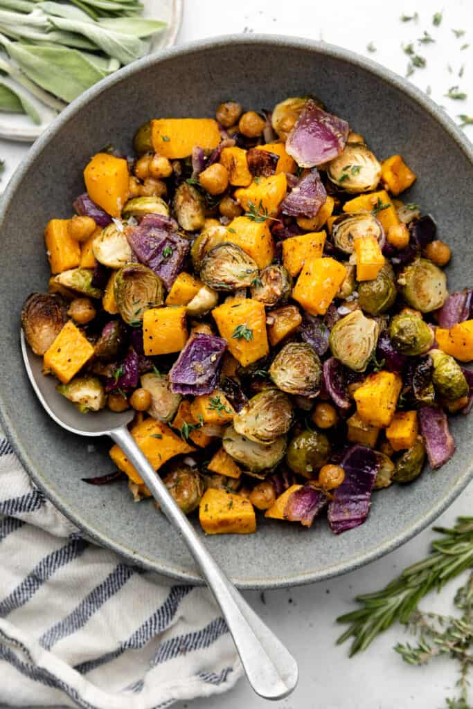 https://allthehealthythings.com/wp-content/uploads/2023/11/roasted-harvest-vegetables-5-683x1024.jpg