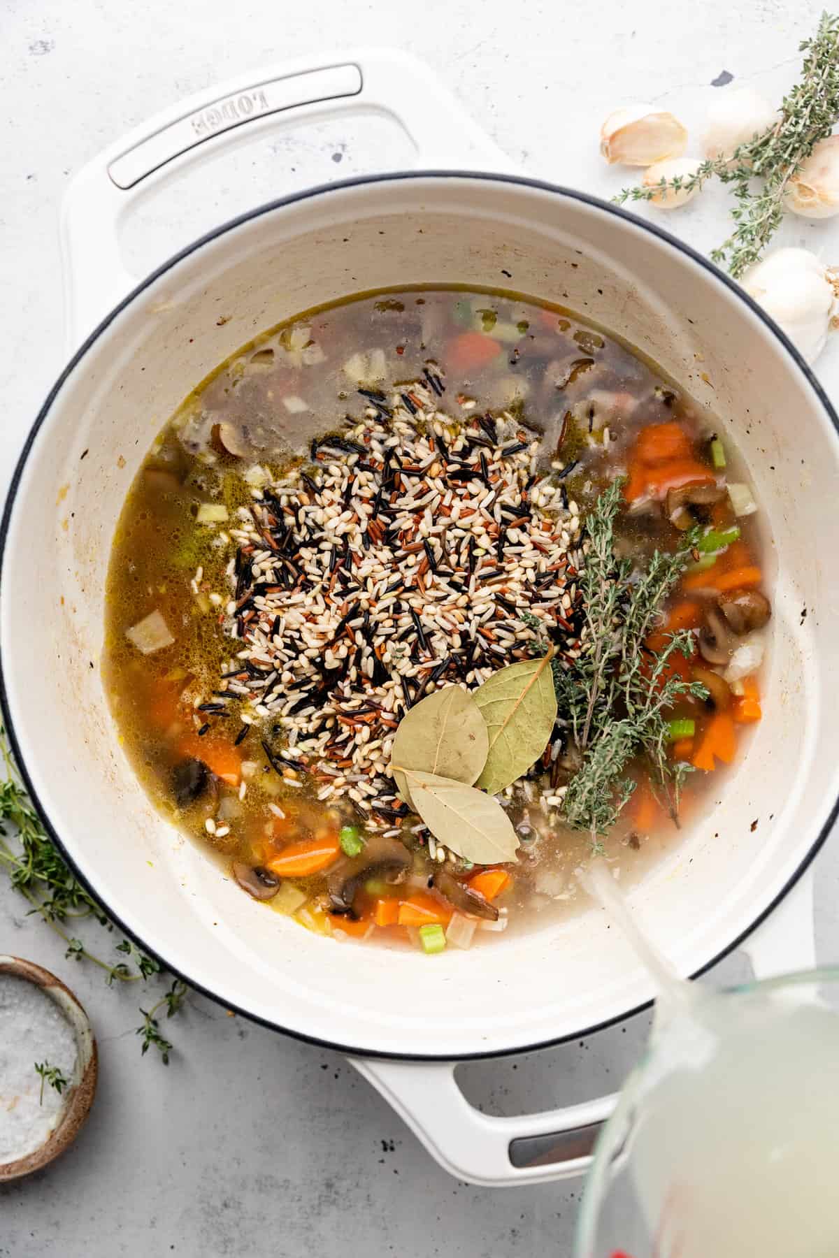 broth and rice in pot 