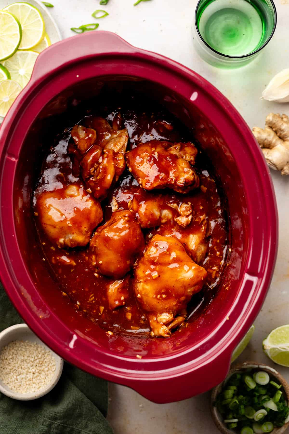 chicken thighs with sauce in slow cooker