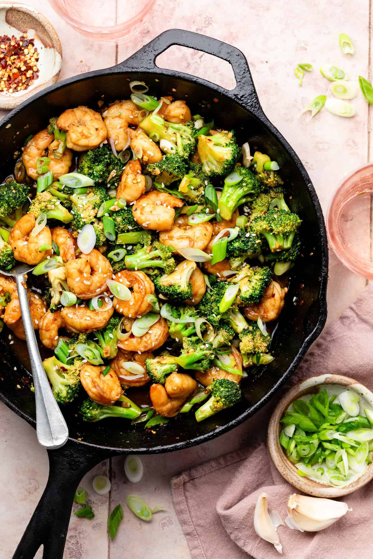shrimp and broccoli stir fry in skillet