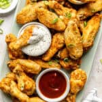 wings on platter with sauces