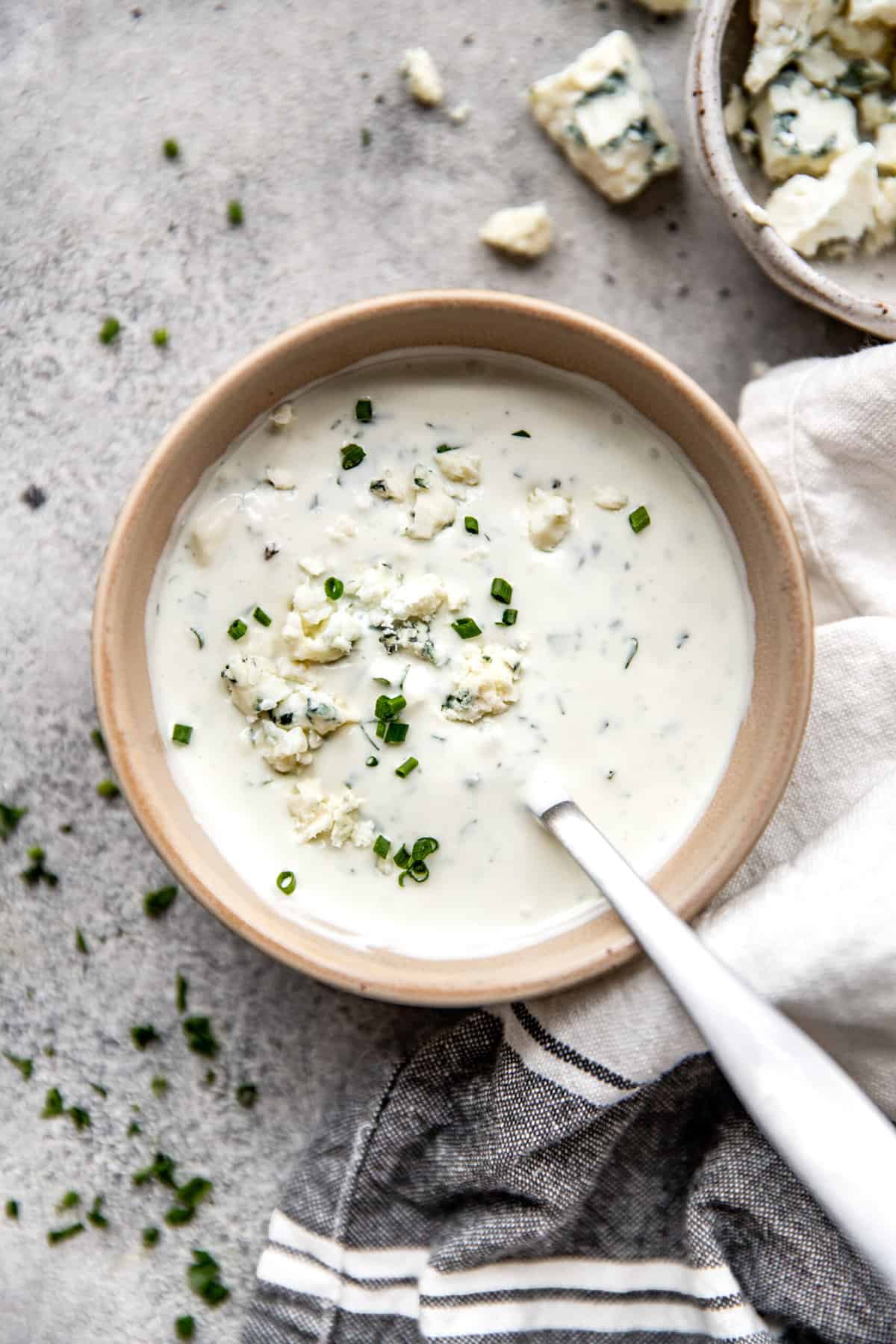 blue cheese dressing in serving bowl with spoon