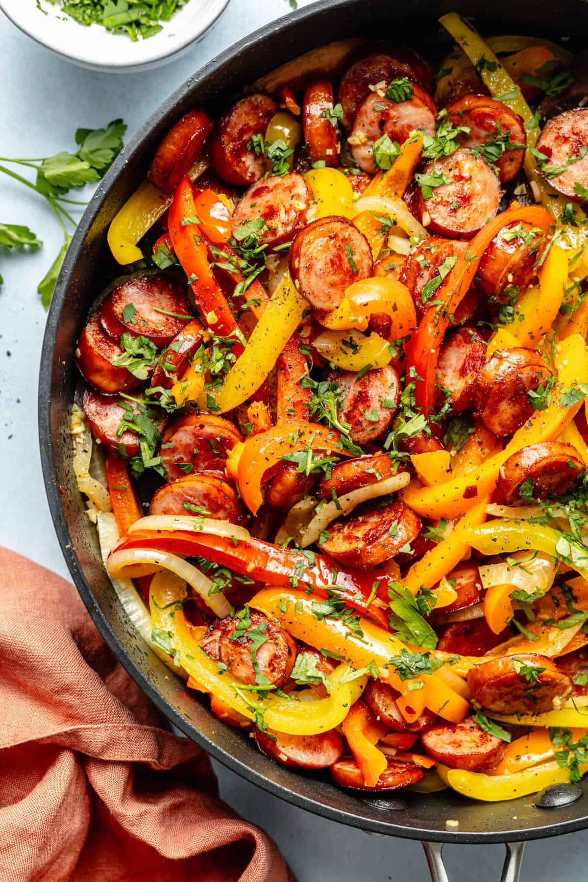 sausage and peppers in skillet