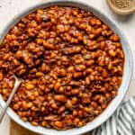 baked beans in bowl with spoon